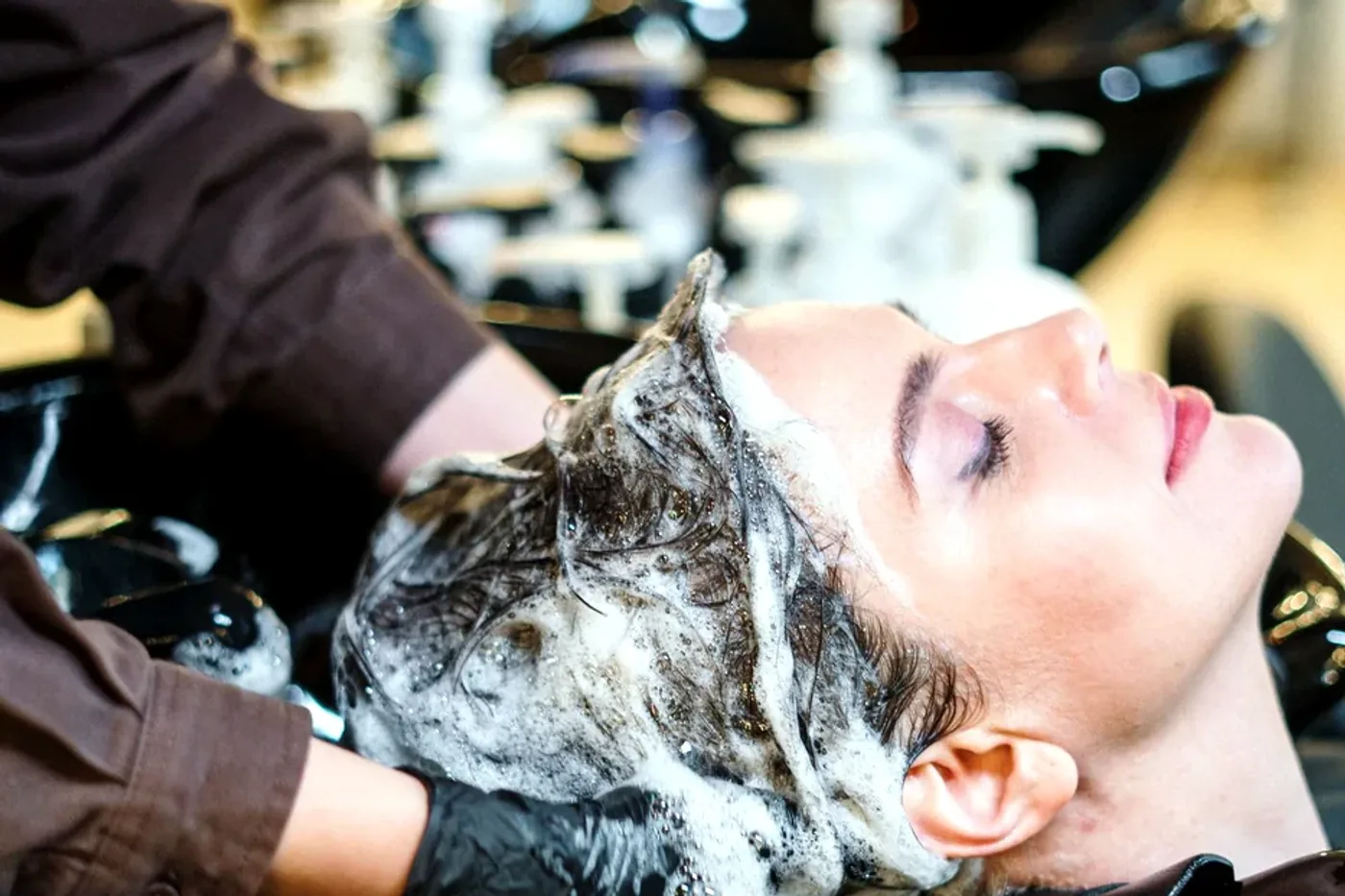 Hair spa wash and scalp treatment in salon